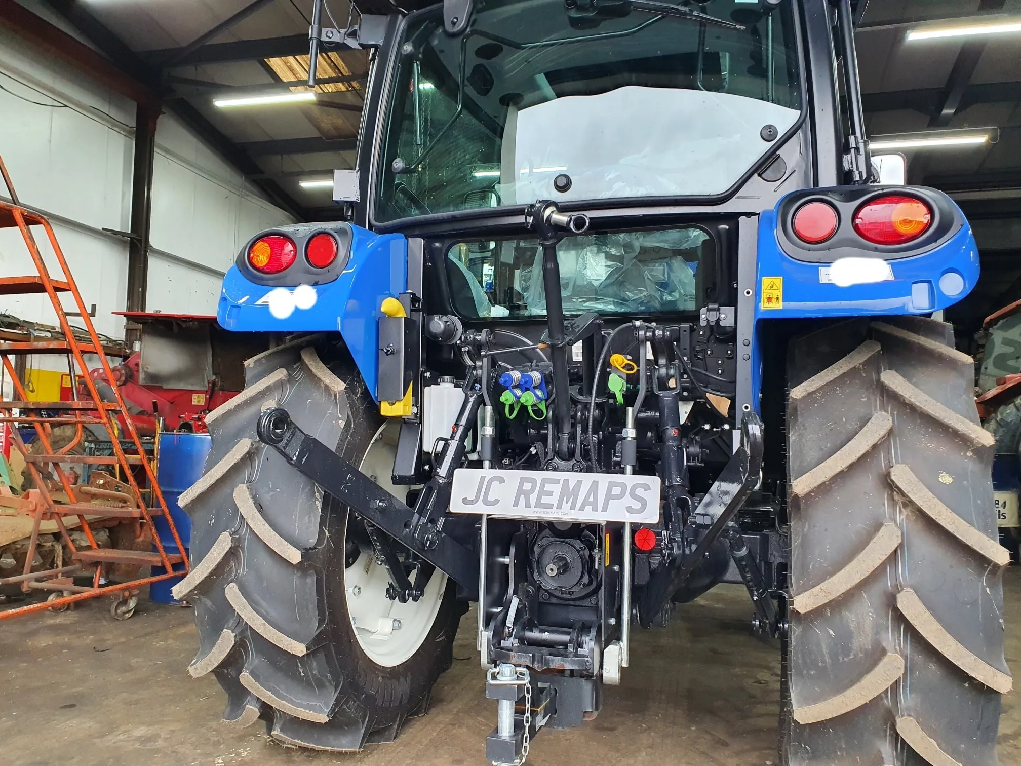 Agricultural tractor prepared in a workshop for vehicle-specific tuning
