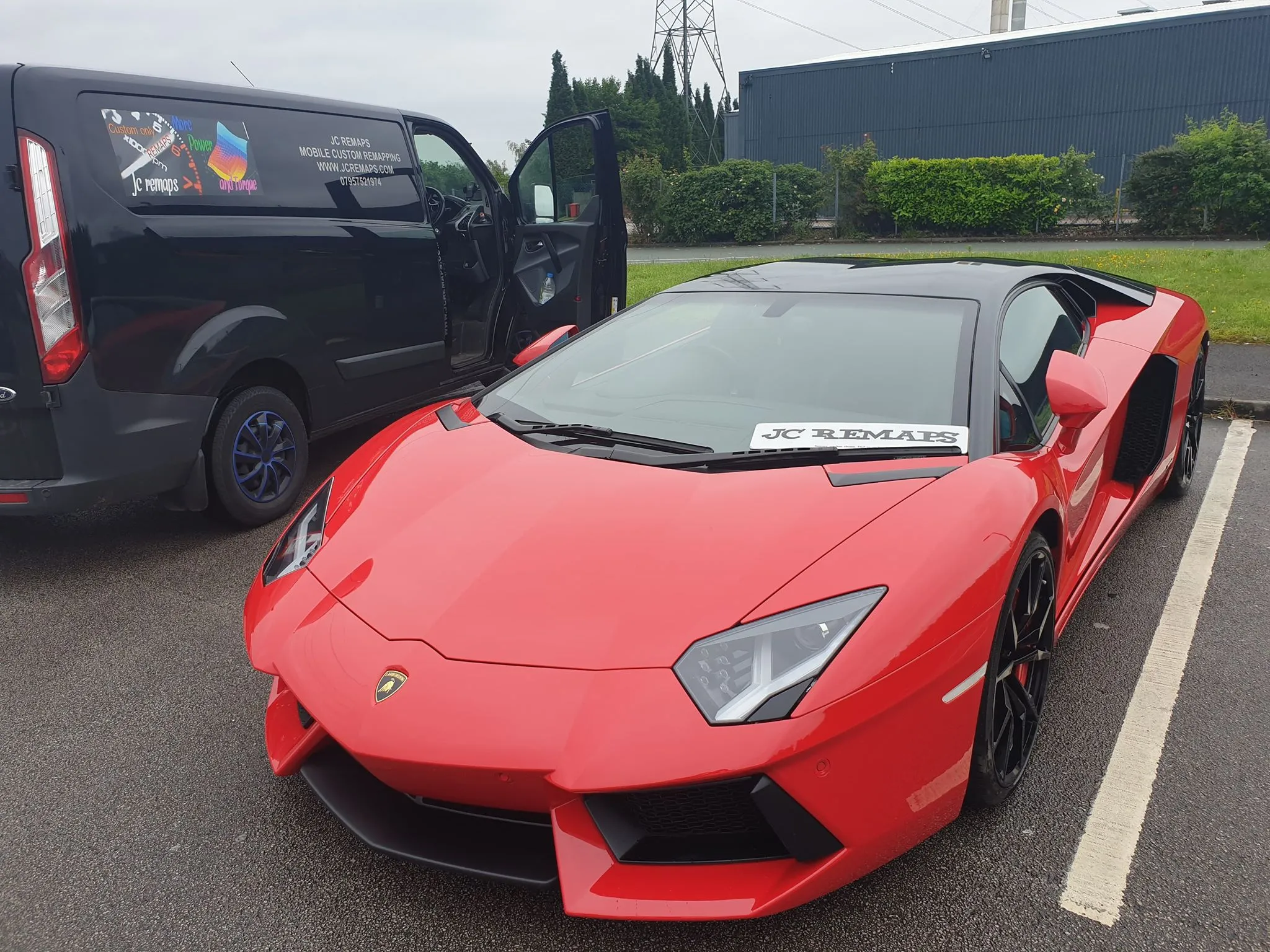 JC Remaps mobile service vehicle beside a customer vehicle